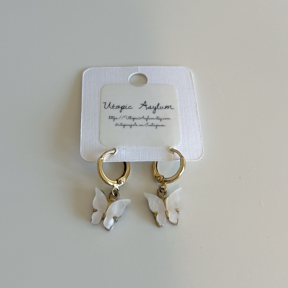 White butterfly earrings